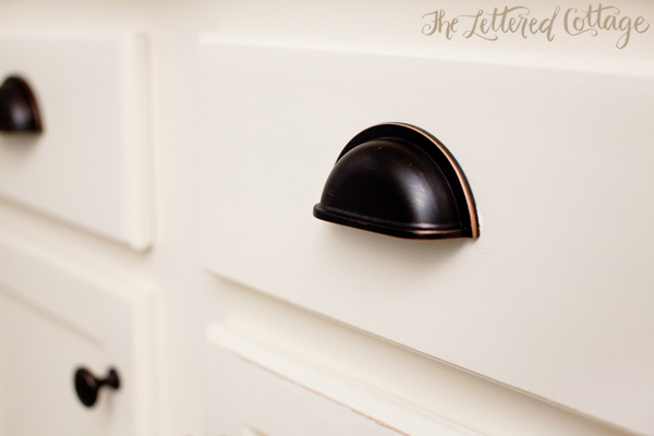 Navajo White Paint Cabinets | Oil Rubbed Bronze Cup Pulls | The Lettered Cottage
