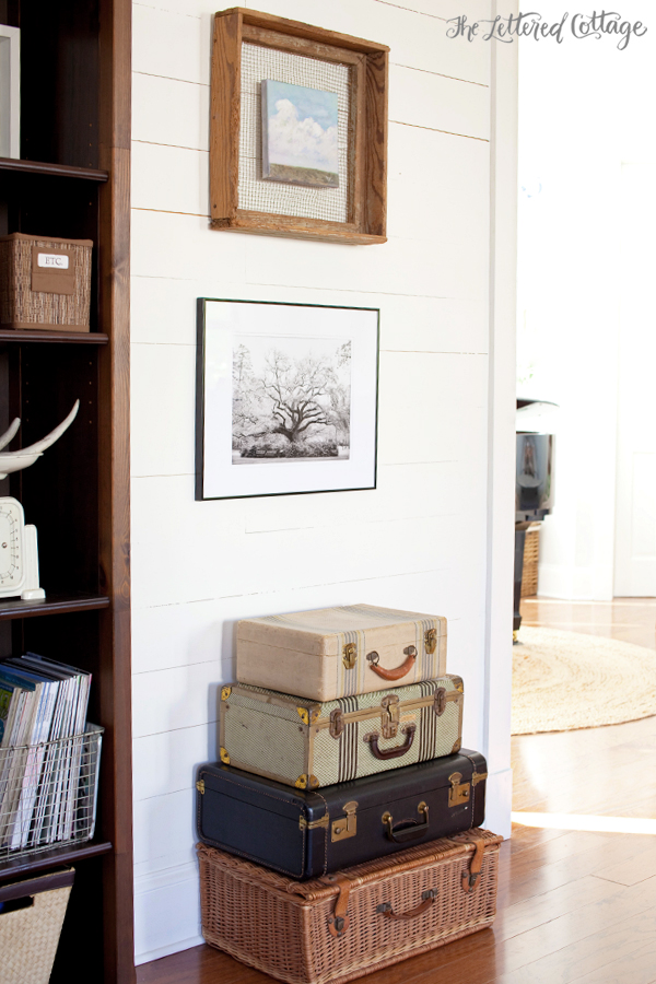 The Lettered Cottage | Living Room | Wood Wall | Vintage Suitcases