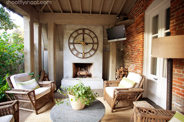 Atchison Home | Outdoor Living Room | Concrete Fireplace | Big Clock