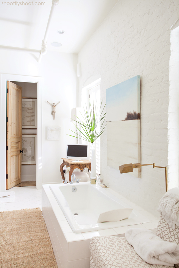 Atchison Home | White Bathroom | Brick Wall