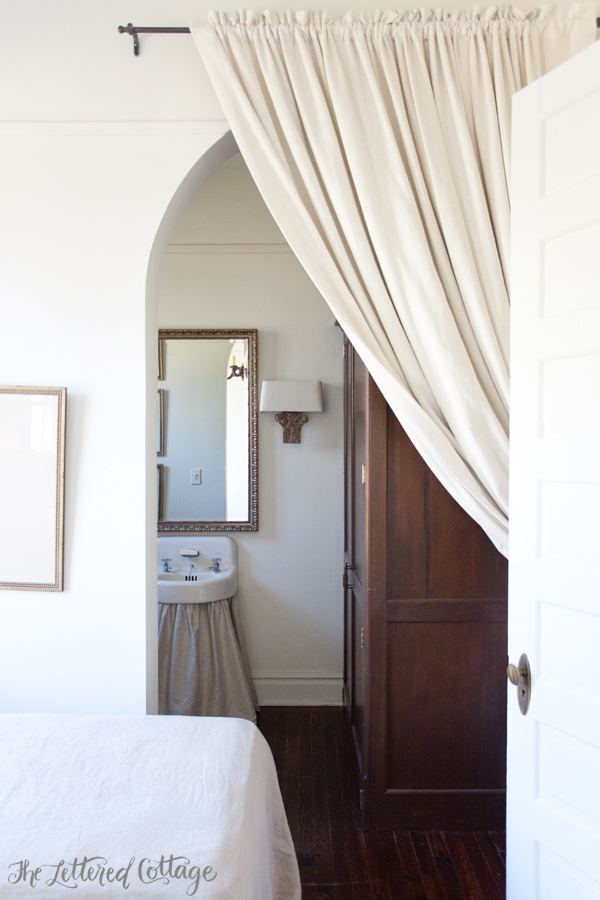 Guest Bathroom | Linen Curtain | Wall Mount Sink | Armoire Shower