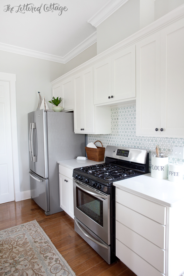 The Lettered Cottage Kitchen | Cabinets are Simply White | Walls are Gray Owl lightened by 50 percent | Backsplash from Caledonia Stone and Tile