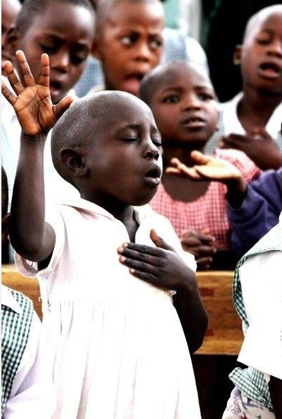 Little girl worshipping God