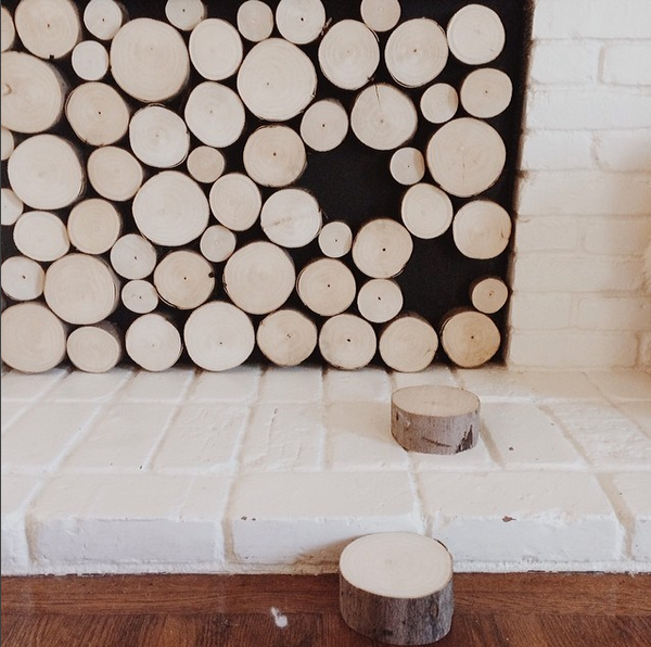 Faux Stacked Log Fireplace Facade | Pepper Design Blog